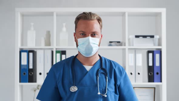 Professional medical doctor in hospital office, Portrait of young and confident physician.