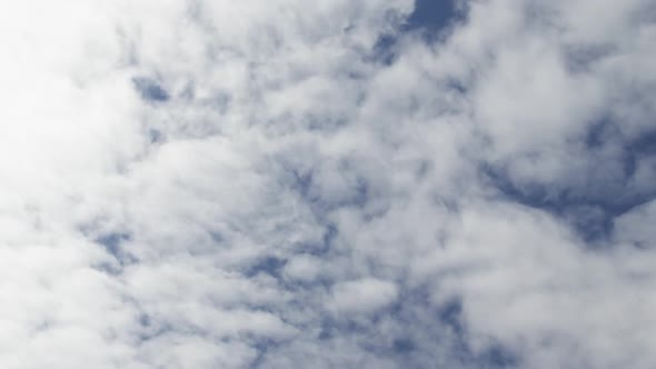 Low angle view of blue sky with clouds