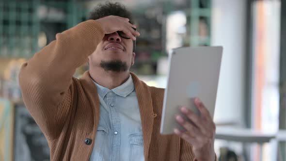 African Man Reacting To Loss Tablet