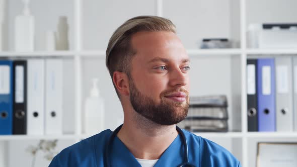 Professional medical doctor in hospital office, Portrait of young and confident physician.