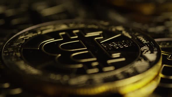 Rotating shot of Bitcoins (digital cryptocurrency) - BITCOIN 0564