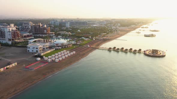 Aerial View of Resort Coastline with Hotel and Sea.