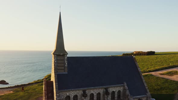 An Old Catholic Church on Top of a Hill Overlooking the Sea