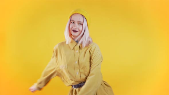 Beautiful Woman with Pink Hair and Piercing Dancing Meme Dance on Yellow