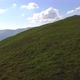 Aerial flight over green hill mountains. FPV Dynamic drone shot - VideoHive Item for Sale