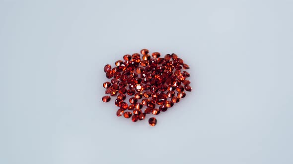 Natural Red Round Spessartins Garnets Gem Stone on the White Background