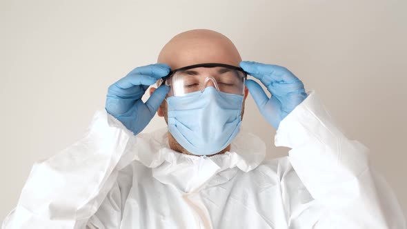 Medical worker doctor nurse trying to breathe through mask