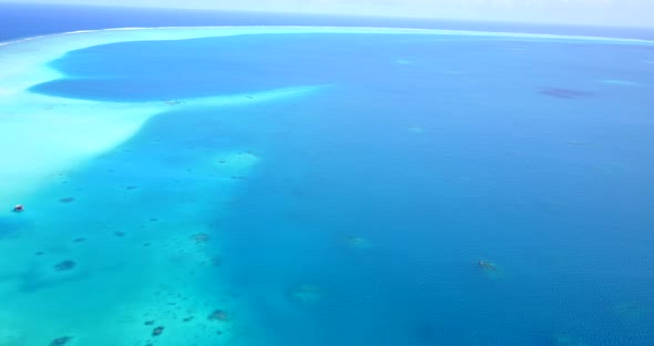 Beautiful birds eye island view of a sunshine white sandy paradise beach and turquoise sea backgroun