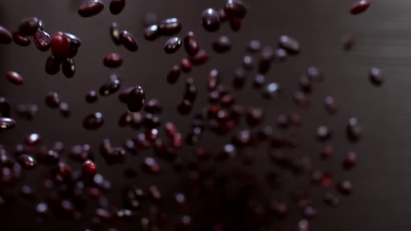 Wonderful tasty beans on a black background. Super slow motion. Macro