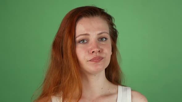 Angry Red Haired Woman on Green Chromakey