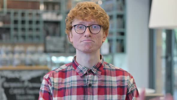 Redhead Man with Laptop Clapping Applauding