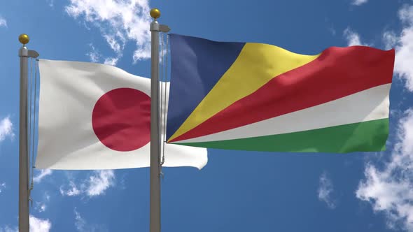 Japan Flag Vs Seychelles Flag On Flagpole