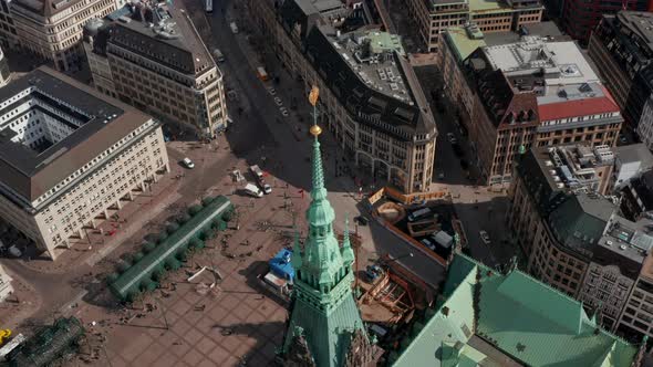 Aerial View of Hamburg City Hall Green Roof with Pedestrians and Urban Traffic on the Streets Below