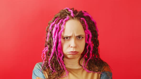 Young Woman with Sad Expression on Her Face