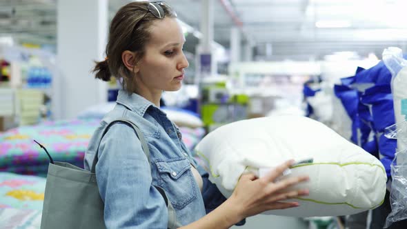 Cute Positive Caucasian Woman in the Store