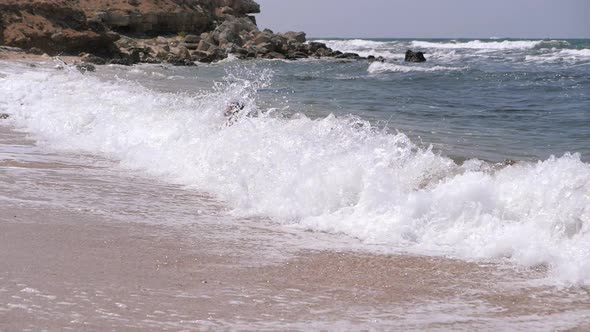 Coastal Sea Waves the Child Dives Into Them