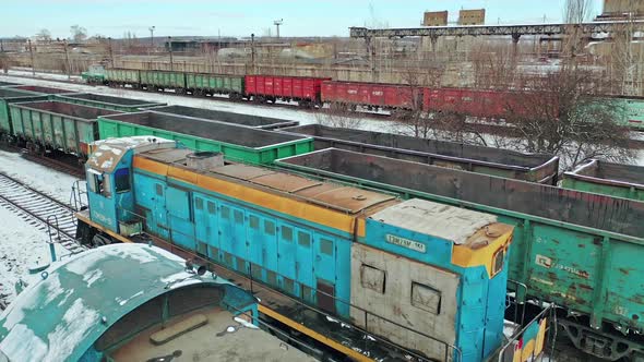 Container Freight Train On Station. Station with freight trains and containers in aerial view