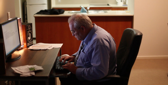 Older Man Typing