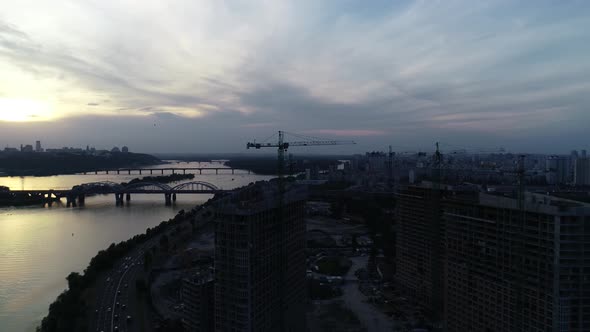 Aerial View of the Construction of a New Modern Residential Complex Near the River Kyiv Ukraine