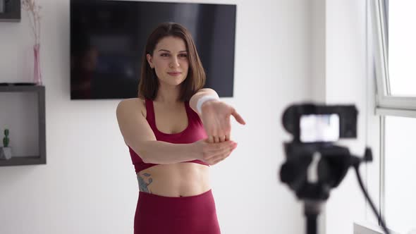 Woman Fitness Instructor Records a Tutorial at Home Introduction