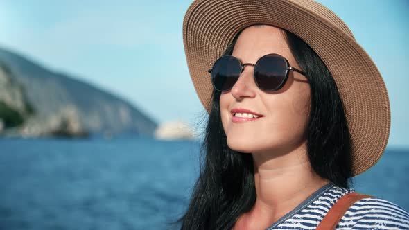 Closeup Face of Fashionable Travel Woman with Tanned Skin Face