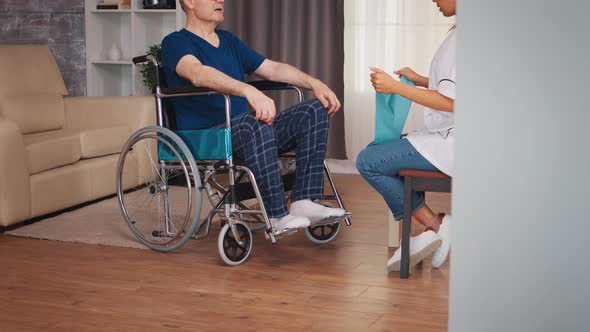 Disabled Senior Patient Working Out