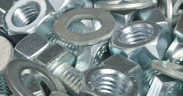 A Group of Bolts Nuts and Washers Close Up