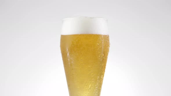 Glass of Beer Rotates 360 Degrees