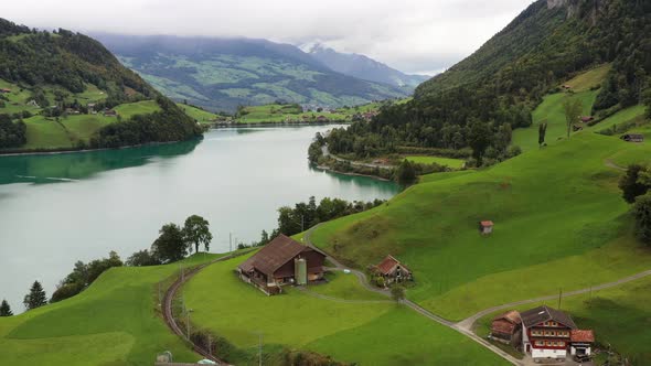 Lungern, Switzerland. Aerial view of the mountain valley and village. The lake among the mountains.