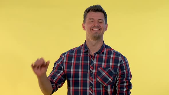 Attractive Young Man Making 'Okay' Hand Sign