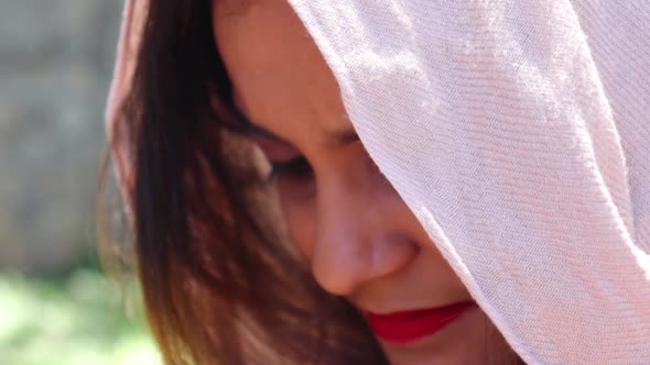 Beautiful Indian woman smiling and looking at the camera