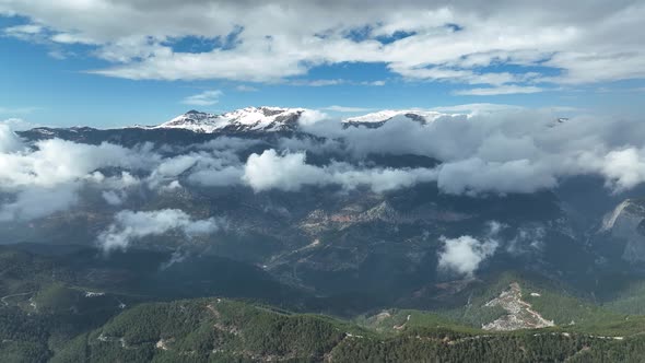 Cloudy landscape high in the mountains aerial view 4 K