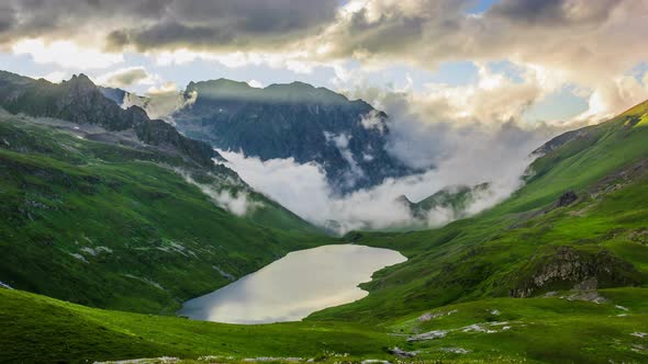 Beautiful Sunlight Through Clouds in the Mountains