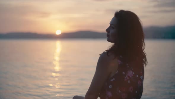 Romantic Caucasian Girl in a Dress By the Sea