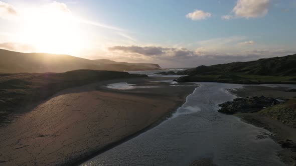 Aerial View of the River Murlin Flowing Into Glen Bay in Glencolumbkille in County Donegal Republic