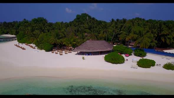 Aerial drone nature of paradise seashore beach break by transparent lagoon and white sandy backgroun