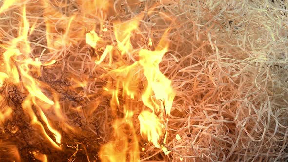 Fire Starts Burning Straw Pile