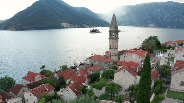 Perast Montenegro - old medieval town with church tower on the coast of Boka Kotor Bay Mediterranean