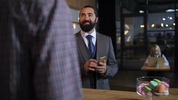 Cheerful Client Making Order at Coffee Shop