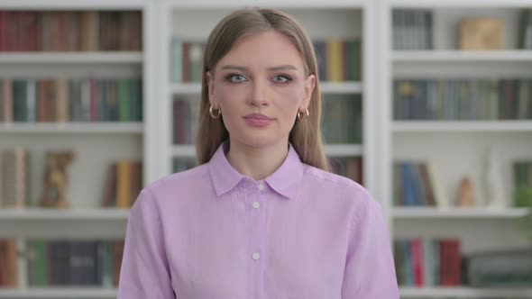 Portrait of Serious Woman Looking at the Camera