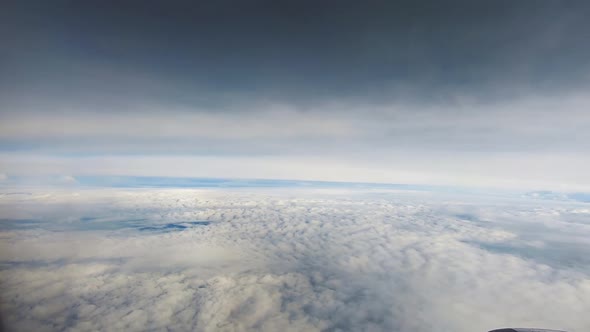 Looking at the clouds and Da Nang city in the airplane in Asia.