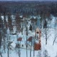 Aerial Top View of the Krimulda Evangelic Lutheran Church in Winter at Sunrise Latvia 4k Video - VideoHive Item for Sale