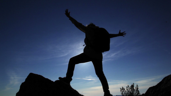 Woman Overcomes Difficult Mountain