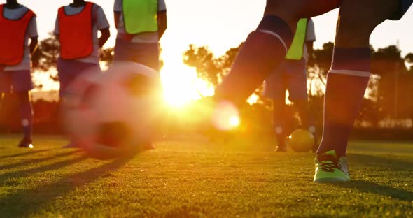 Female soccer players waiting to kick the ball on soccer field. 4k