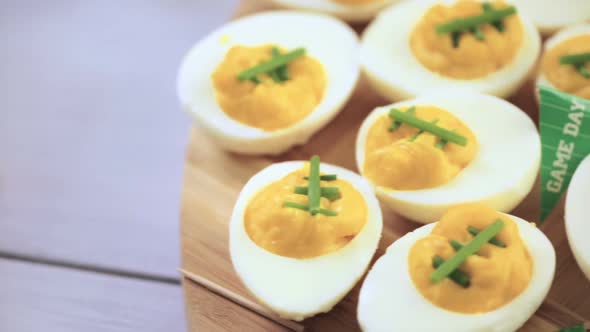 Football deviled eggs for Super Bowl party.