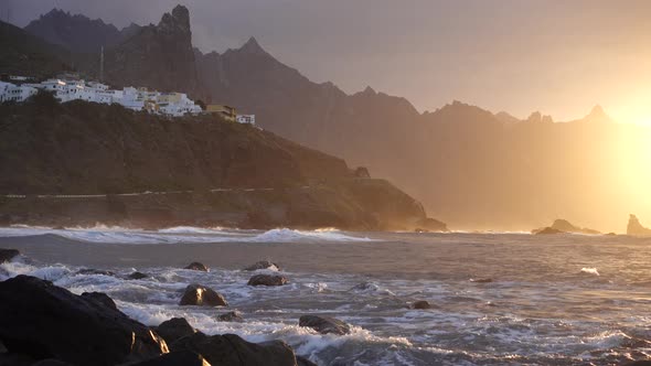 Ocean Waves Crash on Rocks in Sunset Light Playa Benijo Beach Tenerife Canary