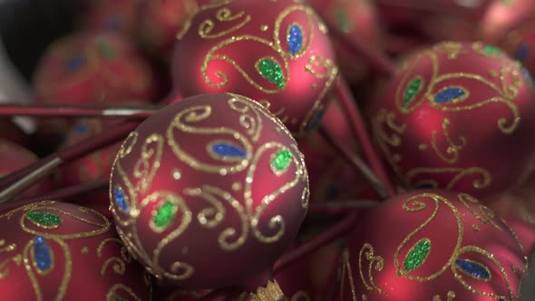 Red glass globes flourished with glitter