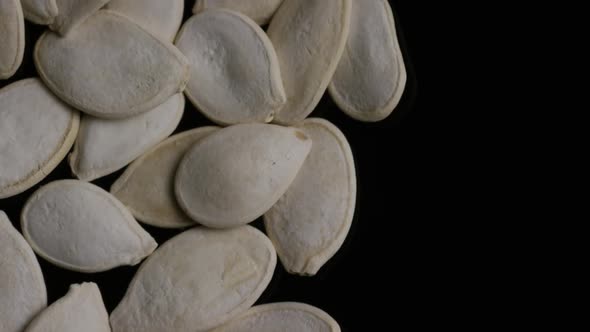 Cinematic, rotating shot of pumpking seeds - PUMPKIN SEEDS 005