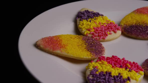 Cinematic, Rotating Shot of Easter Cookies on a Plate 