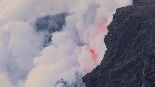 Lava from the Kilauea volcano flows into the ocean